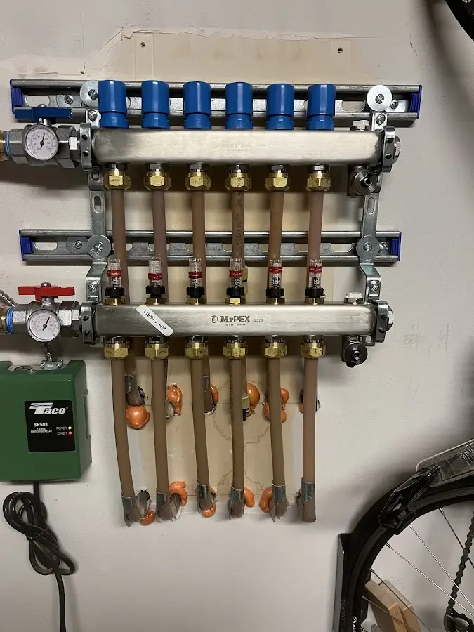 Plumber performing Water Heater Repair at a residential property in Hiawatha